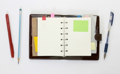 Notebook with sticky note