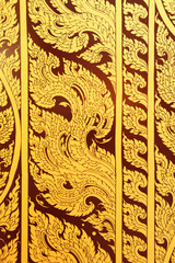 Fototapeta na wymiar Beautiful Decorate door at Wat Phra Keao