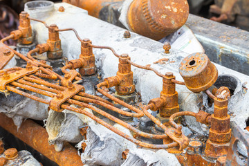 old rusty injector and fuel pipe of diesel engine