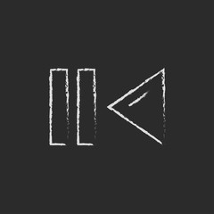 Pause and playback button icon drawn in chalk.