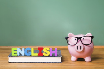 English language theme with pink piggy bank with chalkboard