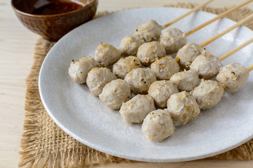 Grilled meat ball with spicy sauce