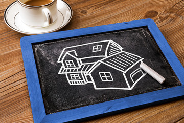 Naklejka premium house hand drawn on blackboard