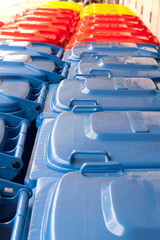 Fototapeta premium blue red yellow bins