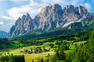 Aalpine village and beautiful mountains, Italy