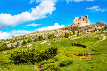 Fototapeta na wymiar Monte Averau, green meadows in Dolomites