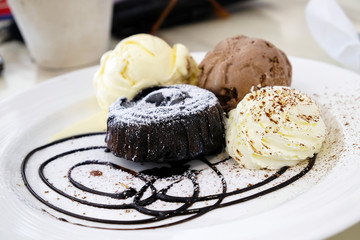 Chocolate lava cake with ice-cream in the dish