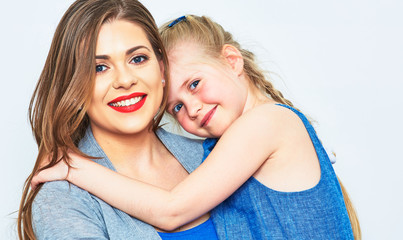 Mother and daughter isolated portrait.