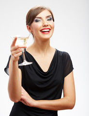 Portrait of smiling woman holding glass with drink.