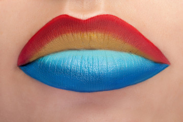 Fashion make up with four colors on lips