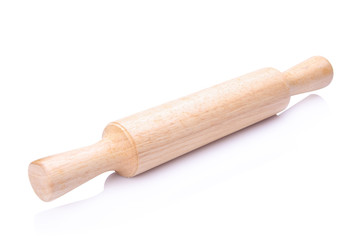 Wooden rolling pin on white background