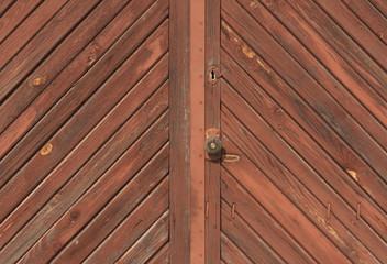 Old locked wooden door.