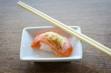 sushi with chopsticks