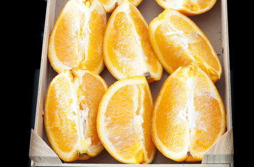 close-up photo of delicious fresh oranges into wedges