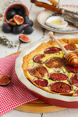 Quiche with figs, thyme and honey.selective focus