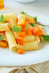 Delicious pasta with carrots and pumkin
