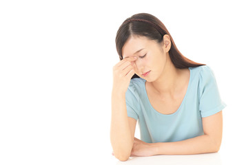 Fototapeta premium 頭痛をうったえる女性