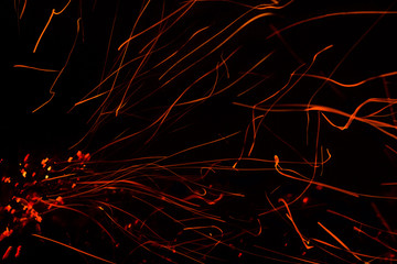 red hot lines sparks on a black background