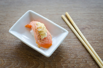 sushi with chopsticks