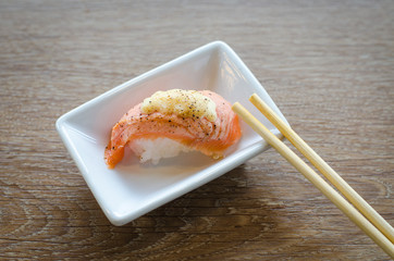 sushi with chopsticks