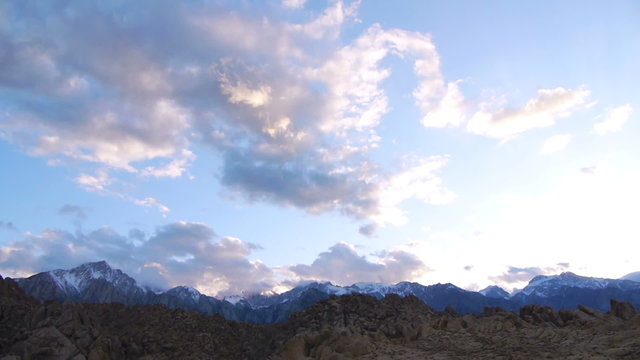 Time lapse footage of heavenly sunset cloudscape over alpine mountain peaks of Sierra Nevada Mountains in California