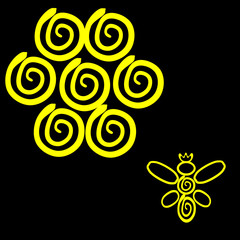 A yellow bee and honey comb at black background