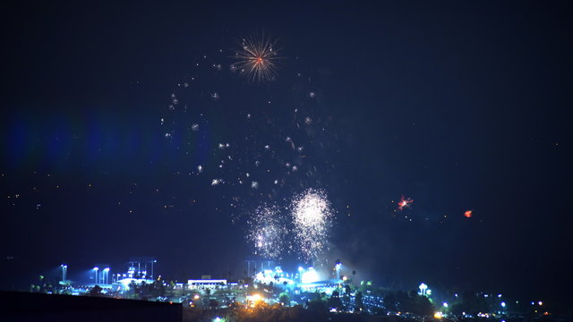 Time lapse footage with tilt up motion of Independence Day fireworks over Dodger Stadium in Los Angeles on 4th of July