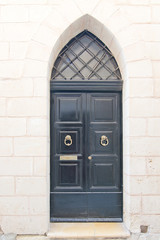 Fototapeta na wymiar Black painted wood door