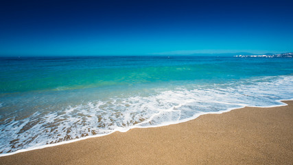 Soft Sea Ocean Waves Wash Over Golden Sand Background