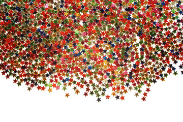 Scattering of tiny stars. Macro. Star background with copy space. Aged filter. Text frame with heap of colorful stars.