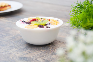 Natural yogurt with fresh berries and cereals