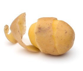 peeled potato tuber with peel spiral isolated on white backgroun