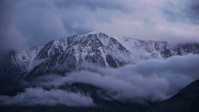 Time lapse footage of heavenly cloudscape over alpine mountain peaks of Sierra Nevada Mountains in California