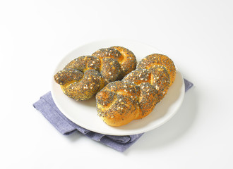 Braided poppy seed bread rolls