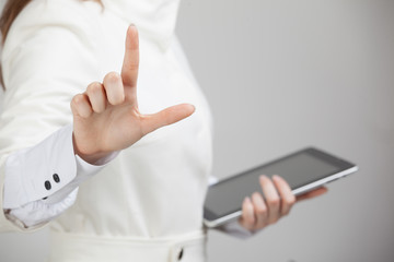 Young girl working with virtual screen