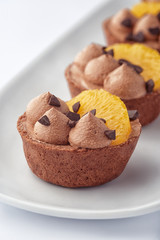 beautiful cream cake dessert with fresh orange