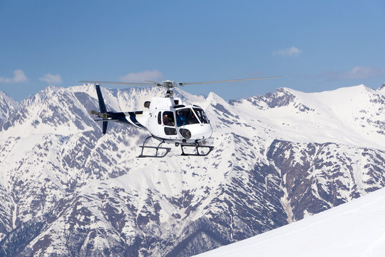 White Rescue Helicopter  In The Mountains