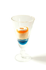 butter cupcakes and sweet dring in clear glass.