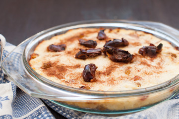 Casserole of cottage cheese with raisins, dates