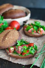 Italian tomato bruschetta with chopped vegetables, herbs and oil