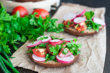 Italian tomato bruschetta with chopped vegetables, herbs and oil