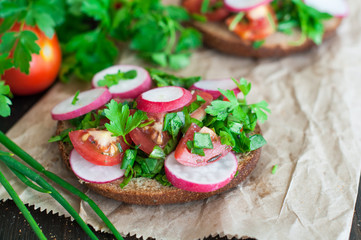 Italian tomato bruschetta with chopped vegetables, herbs and oil