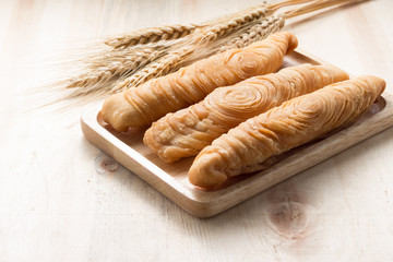 curry puff stick on wooden background