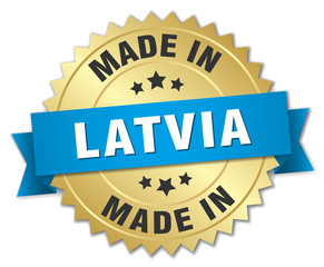 made in Latvia gold badge with blue ribbon