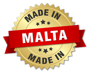 made in Malta gold badge with red ribbon