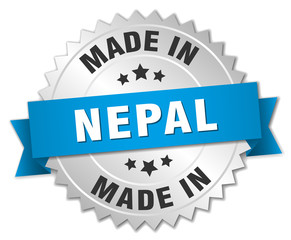 made in Nepal silver badge with blue ribbon