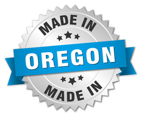 made in Oregon silver badge with blue ribbon