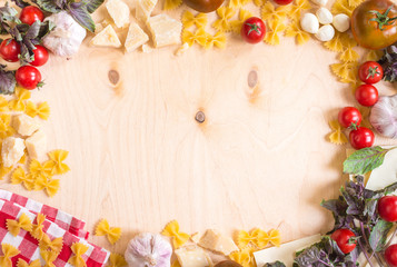 Rustic wooden food background with italian food ingredients