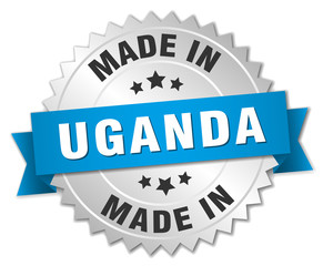 made in Uganda silver badge with blue ribbon