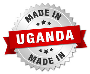 made in Uganda silver badge with red ribbon